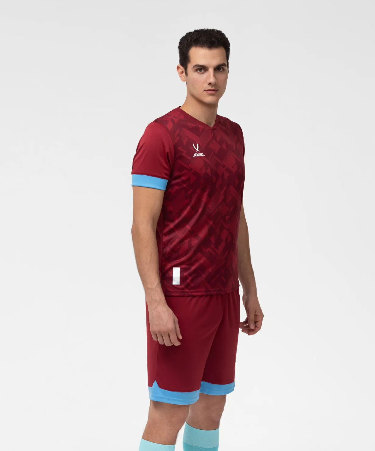 Реальное фото Футболка игровая JÖGEL DIVISION PerFormDRY Union Jersey, гранатовый/голубой/белый от магазина Спортев