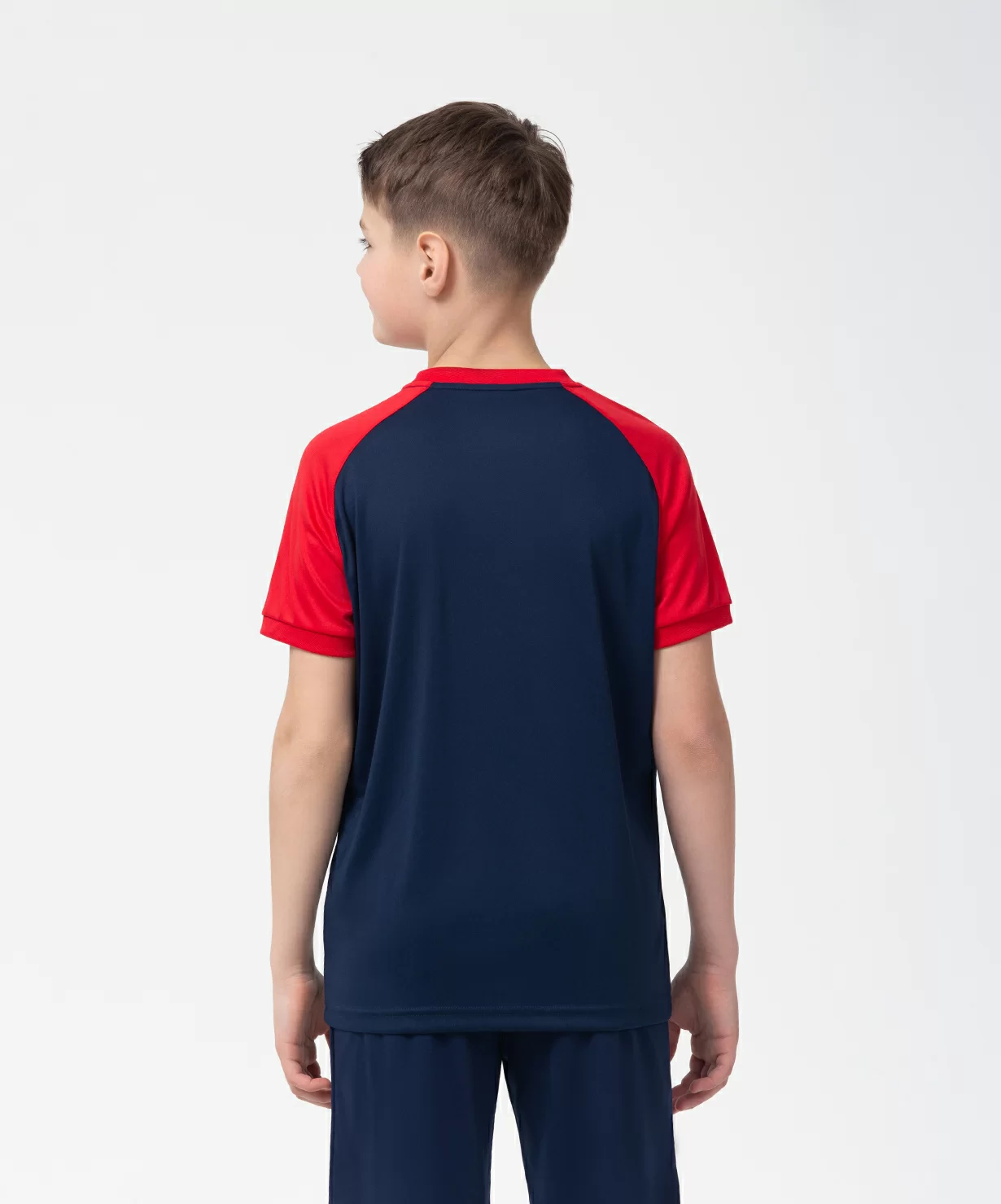 Реальное фото Футболка игровая JÖGEL CAMP Reglan Jersey, темно-синий/красный, детский от магазина Спортев