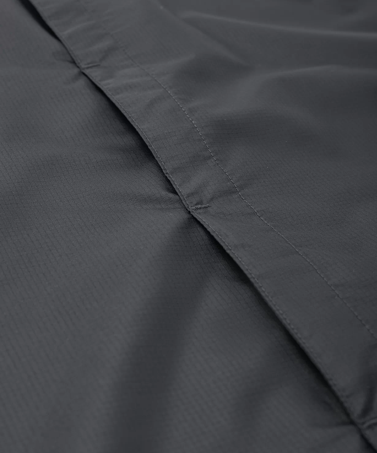 Реальное фото Куртка ветрозащитная DIVISION PerFormPROOF Shower Jacket, черный, детский Jögel от магазина СпортЕВ