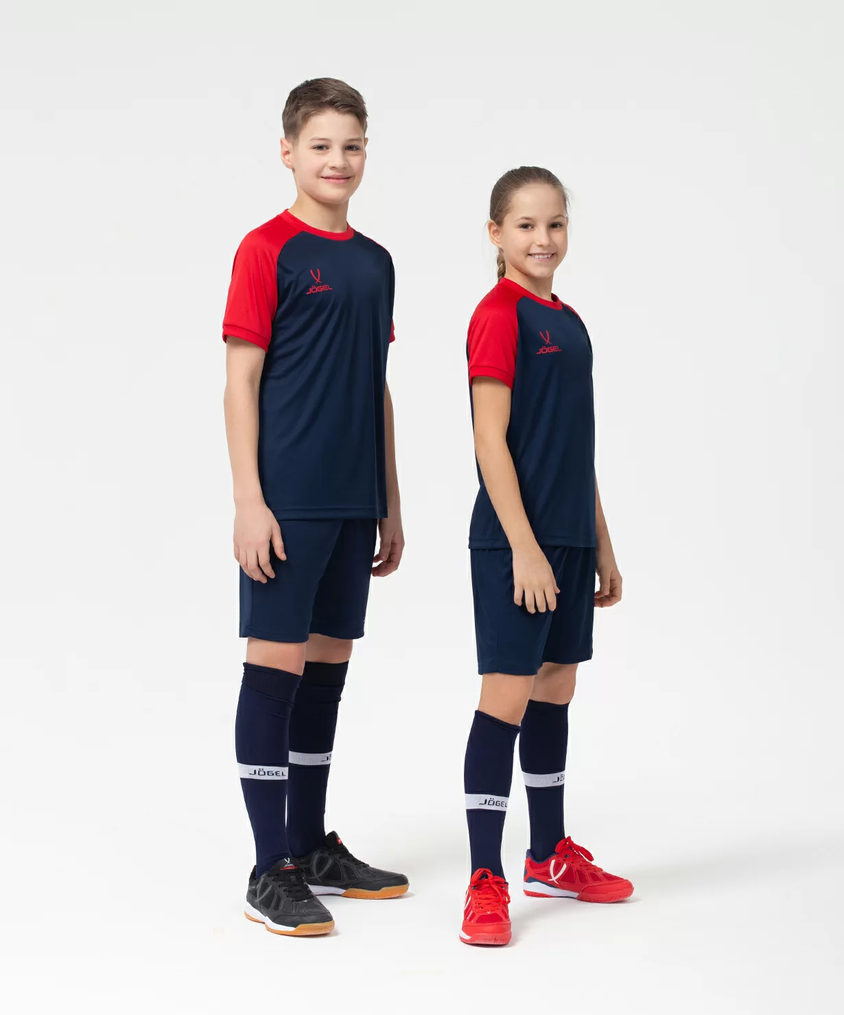 Реальное фото Футболка игровая JÖGEL CAMP Reglan Jersey, темно-синий/красный, детский от магазина Спортев