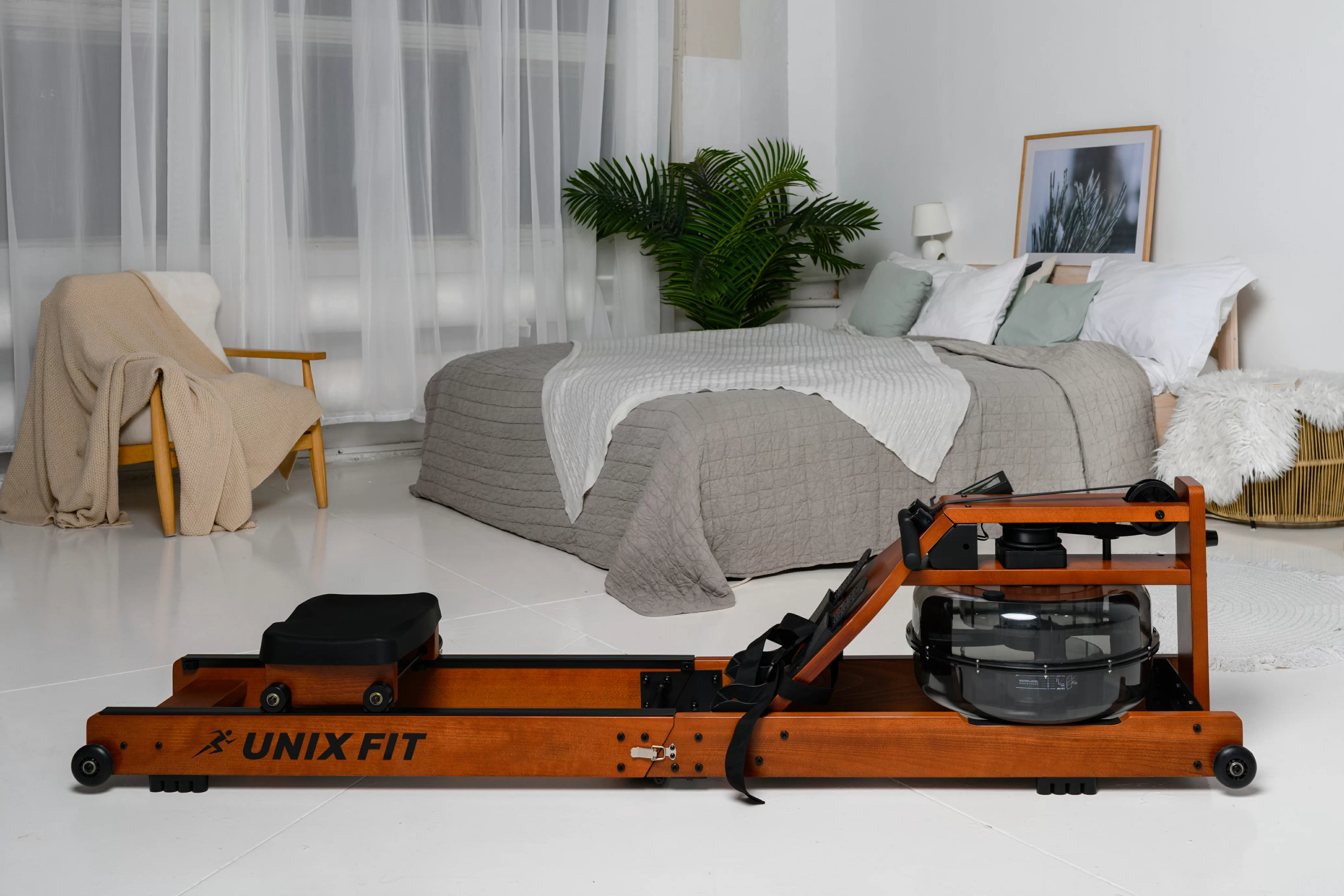 Реальное фото Гребной тренажер UNIX Fit Wood Rower Dark от магазина Спортев