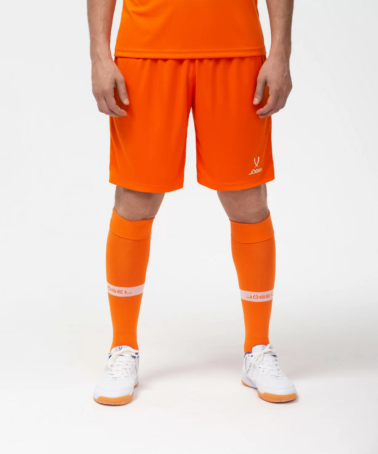 Реальное фото Шорты игровые JÖGEL CAMP Classic Shorts, оранжевый/белый от магазина Спортев