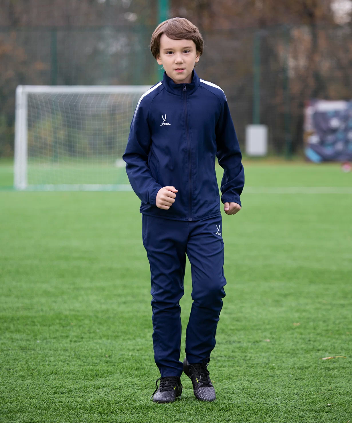 Реальное фото Костюм спортивный CAMP Lined Suit, темно-синий/темно-синий, детский Jögel от магазина СпортЕВ