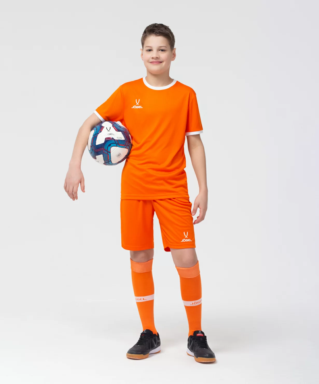 Реальное фото Шорты игровые JÖGEL CAMP Classic Shorts, оранжевый/белый, детский от магазина Спортев