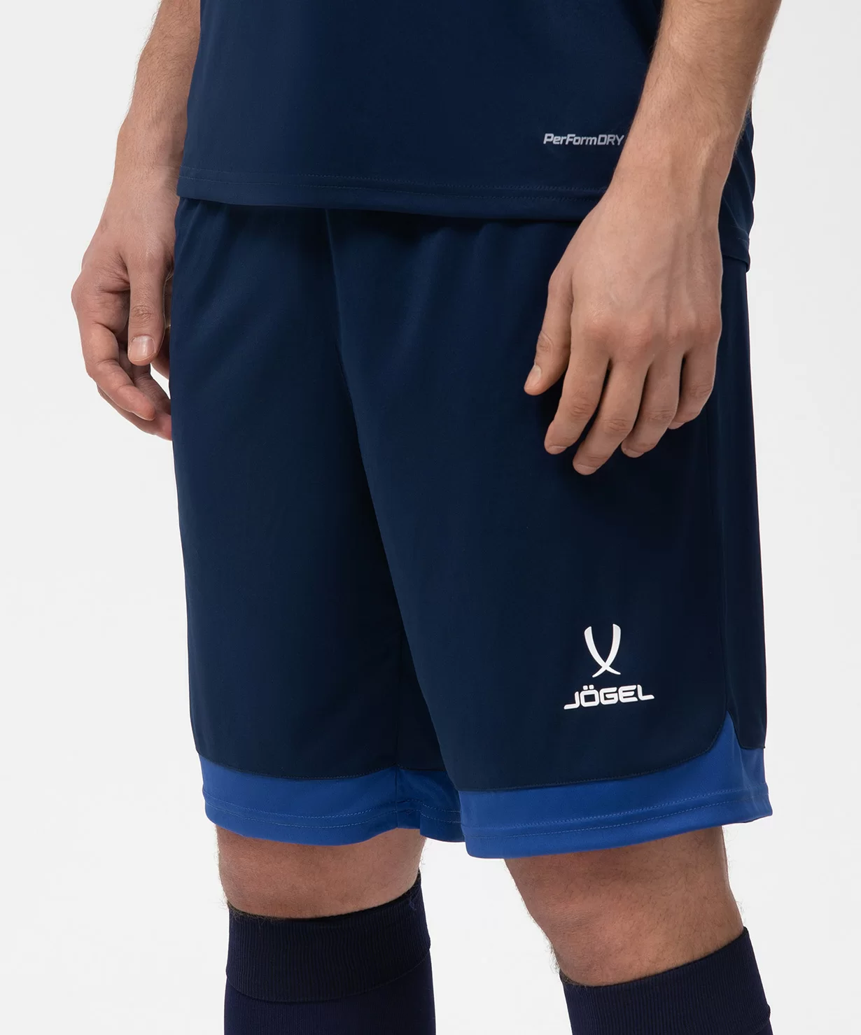 Реальное фото Шорты игровые DIVISION PerFormDRY Union Shorts, темно-синий/синий/белый Jögel от магазина Спортев