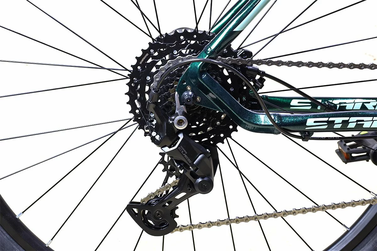 Реальное фото Велосипед Stark Router 29 4 HD (2024) темно-зеленый металлик/мятный HQ-0014168 от магазина СпортЕВ