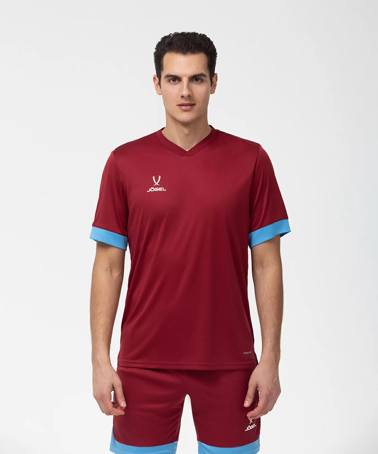 Реальное фото Футболка игровая JÖGEL DIVISION PerFormDRY Union Jersey, гранатовый/голубой/белый от магазина Спортев