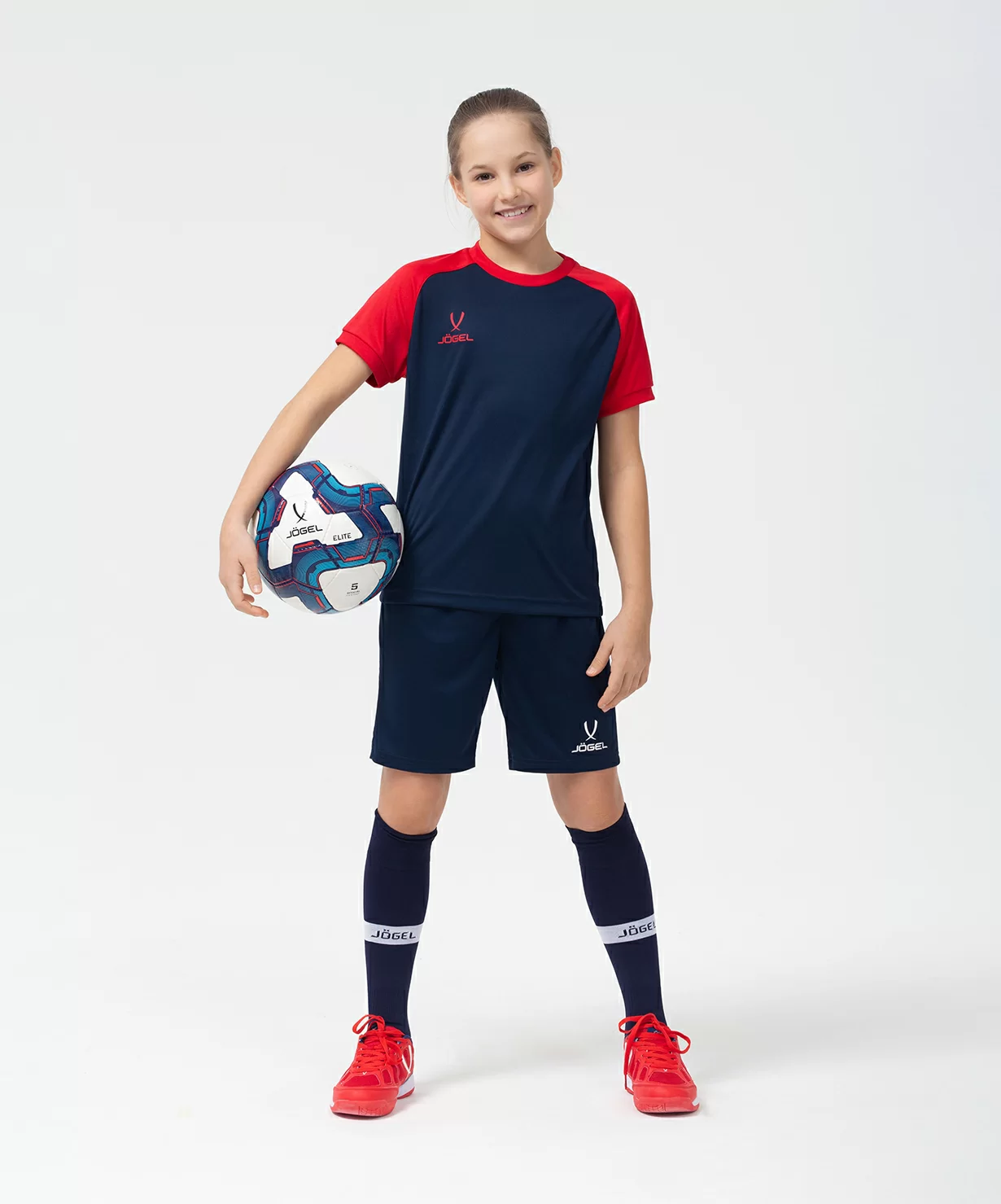 Реальное фото Футболка игровая JÖGEL CAMP Reglan Jersey, темно-синий/красный, детский от магазина Спортев