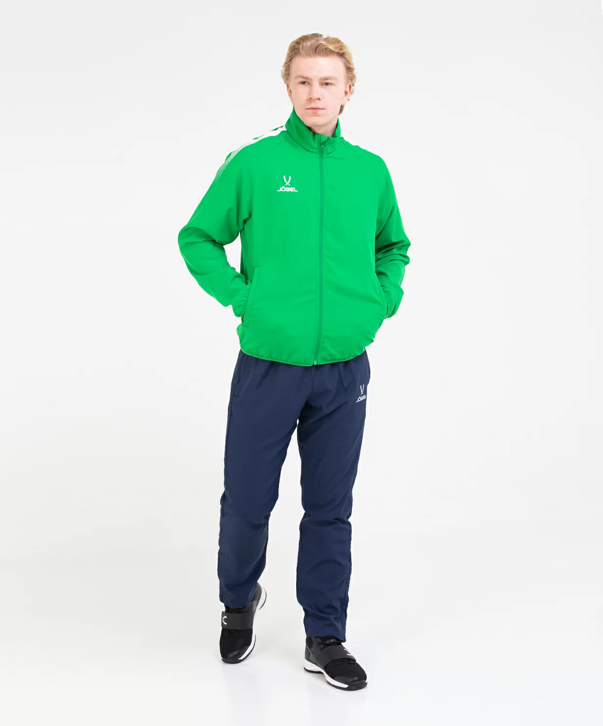 Реальное фото Костюм спортивный CAMP Lined Suit, зеленый/темно-синий Jögel от магазина СпортЕВ