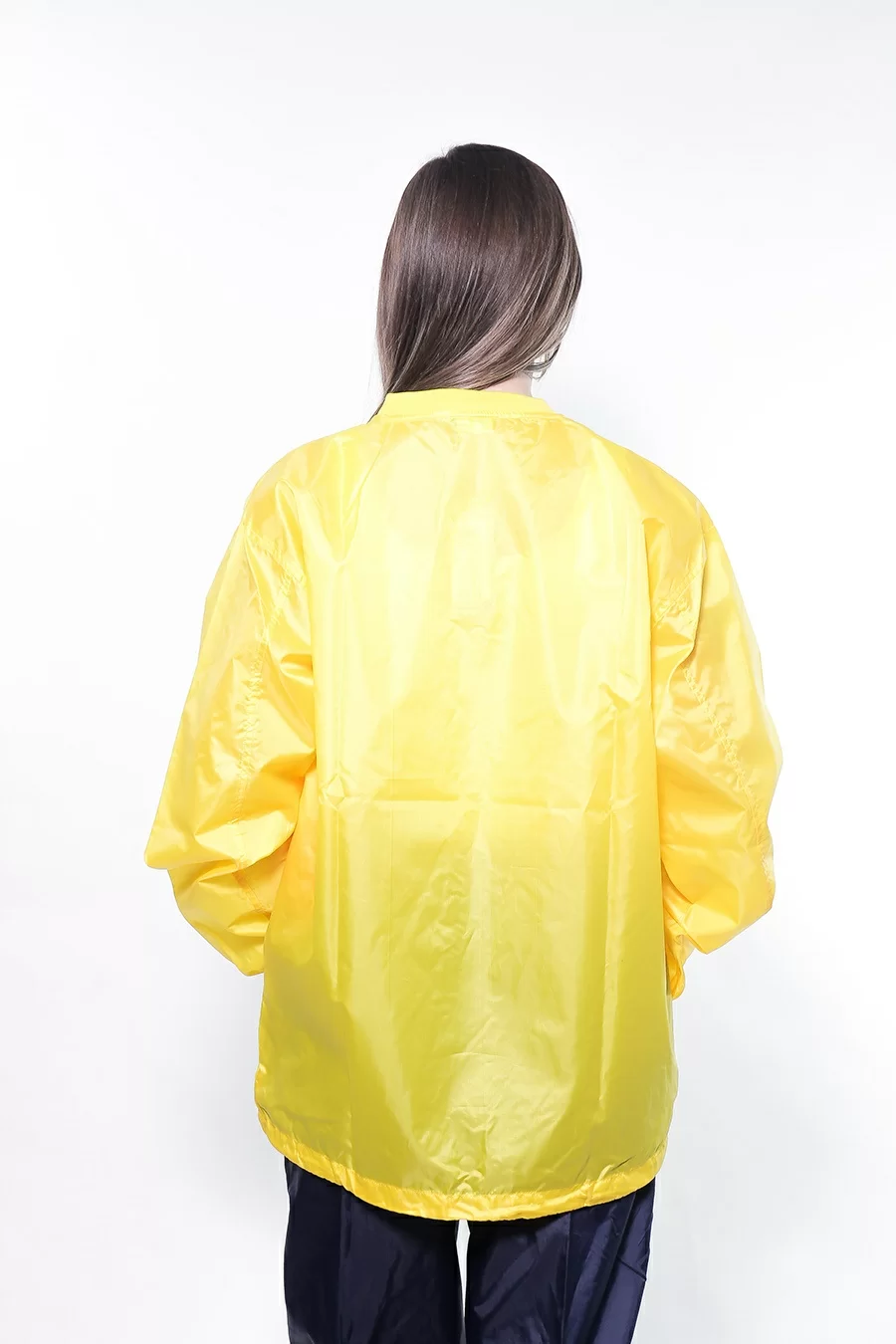 Реальное фото Куртка Asics V-Jacket TRA желтая T618Z9/0082 от магазина СпортЕВ