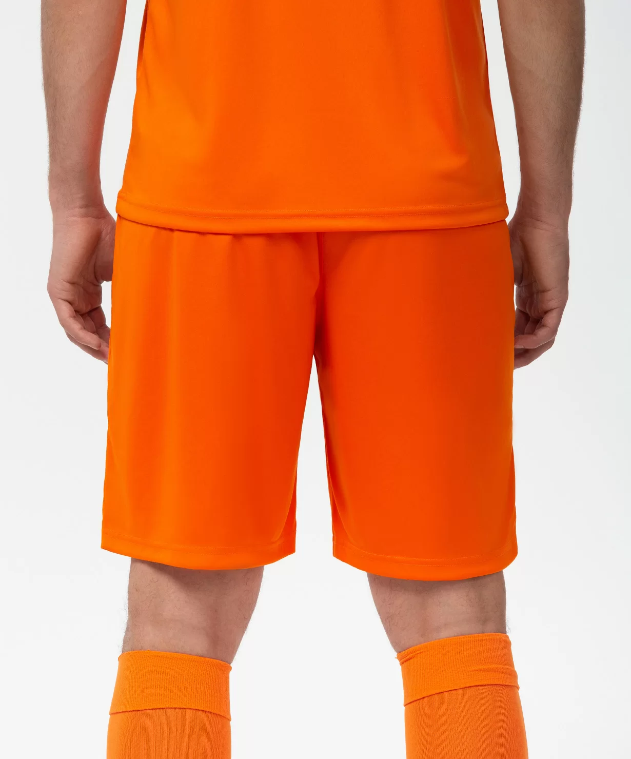 Реальное фото Шорты игровые JÖGEL CAMP Classic Shorts, оранжевый/белый от магазина Спортев
