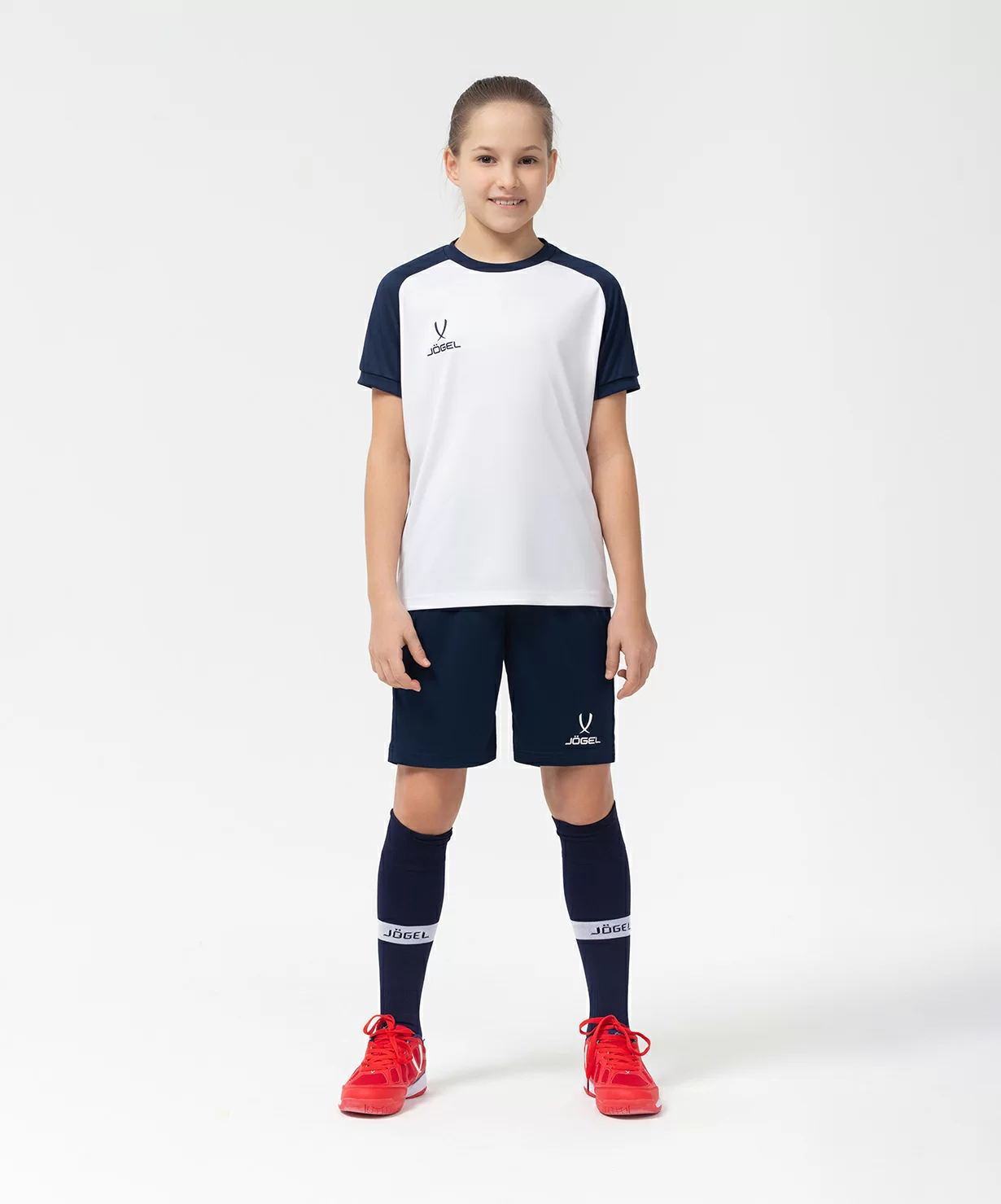 Реальное фото Футболка игровая JÖGEL CAMP Reglan Jersey, белый/темно-синий, детский от магазина Спортев