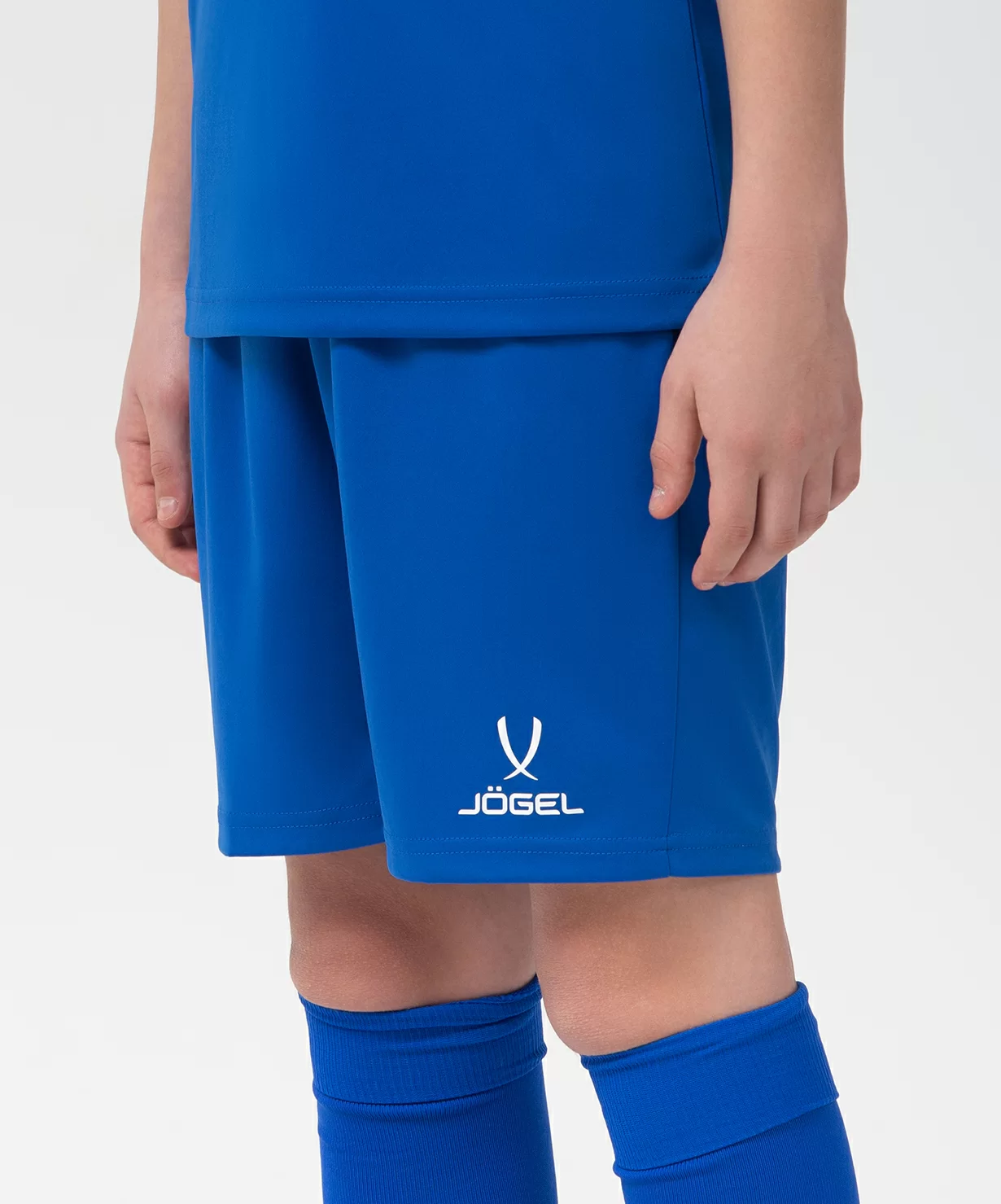 Реальное фото Шорты игровые JÖGEL CAMP Classic Shorts, синий/белый, детский от магазина Спортев