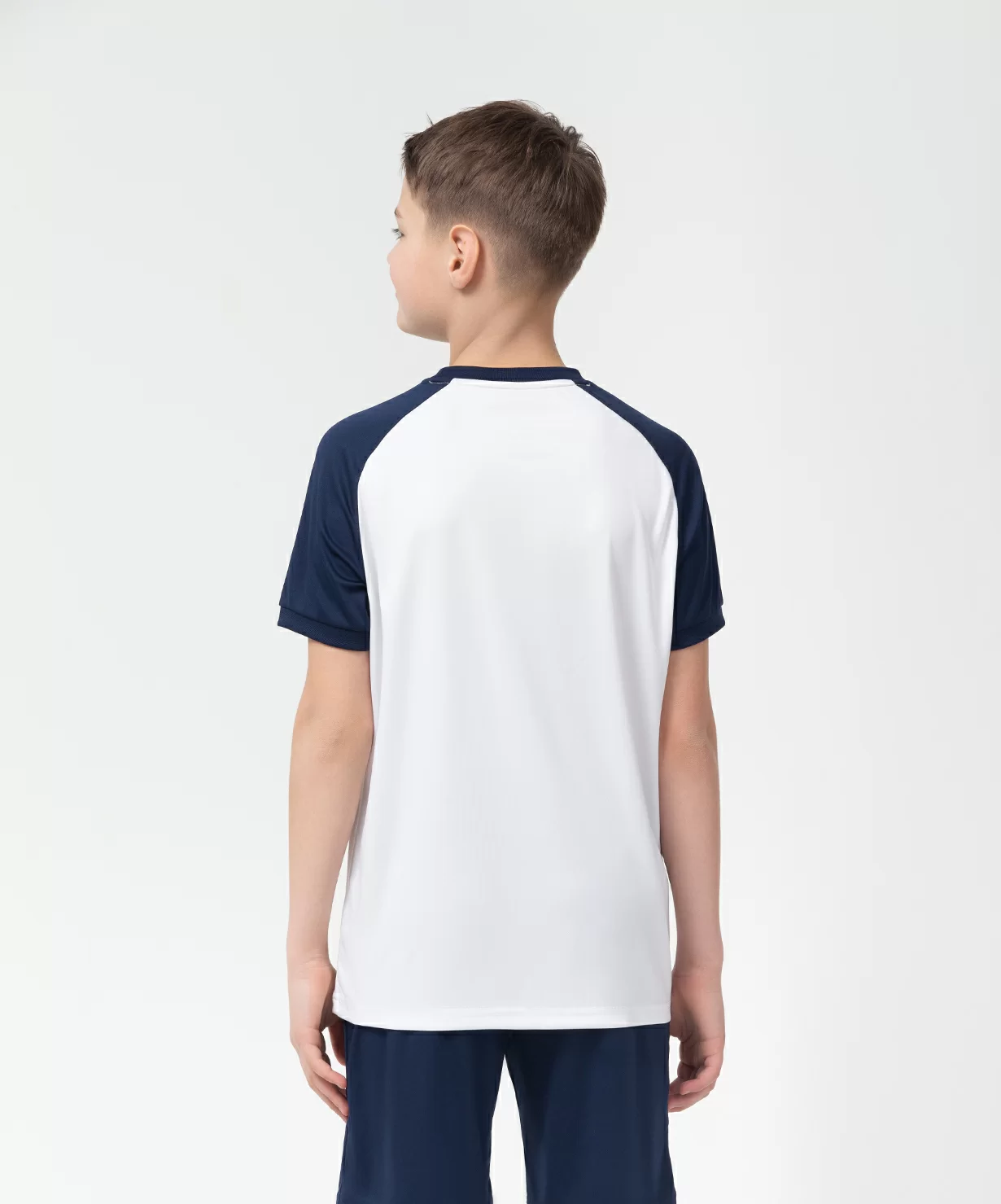 Реальное фото Футболка игровая JÖGEL CAMP Reglan Jersey, белый/темно-синий, детский от магазина Спортев