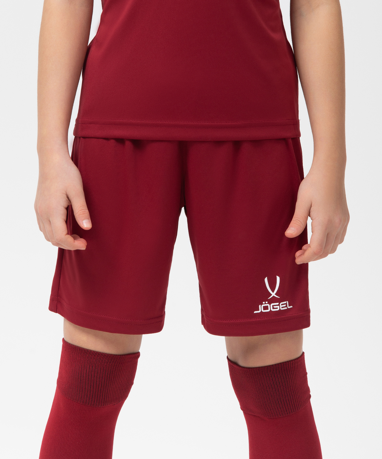 Реальное фото Шорты игровые JÖGEL CAMP Classic Shorts, гранатовый/белый, детский от магазина Спортев